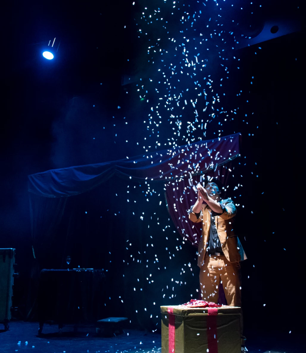 Harry Covert creates a stage snowstorm during the finale of his show